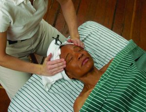 Woman Lying Supine On Massage Table